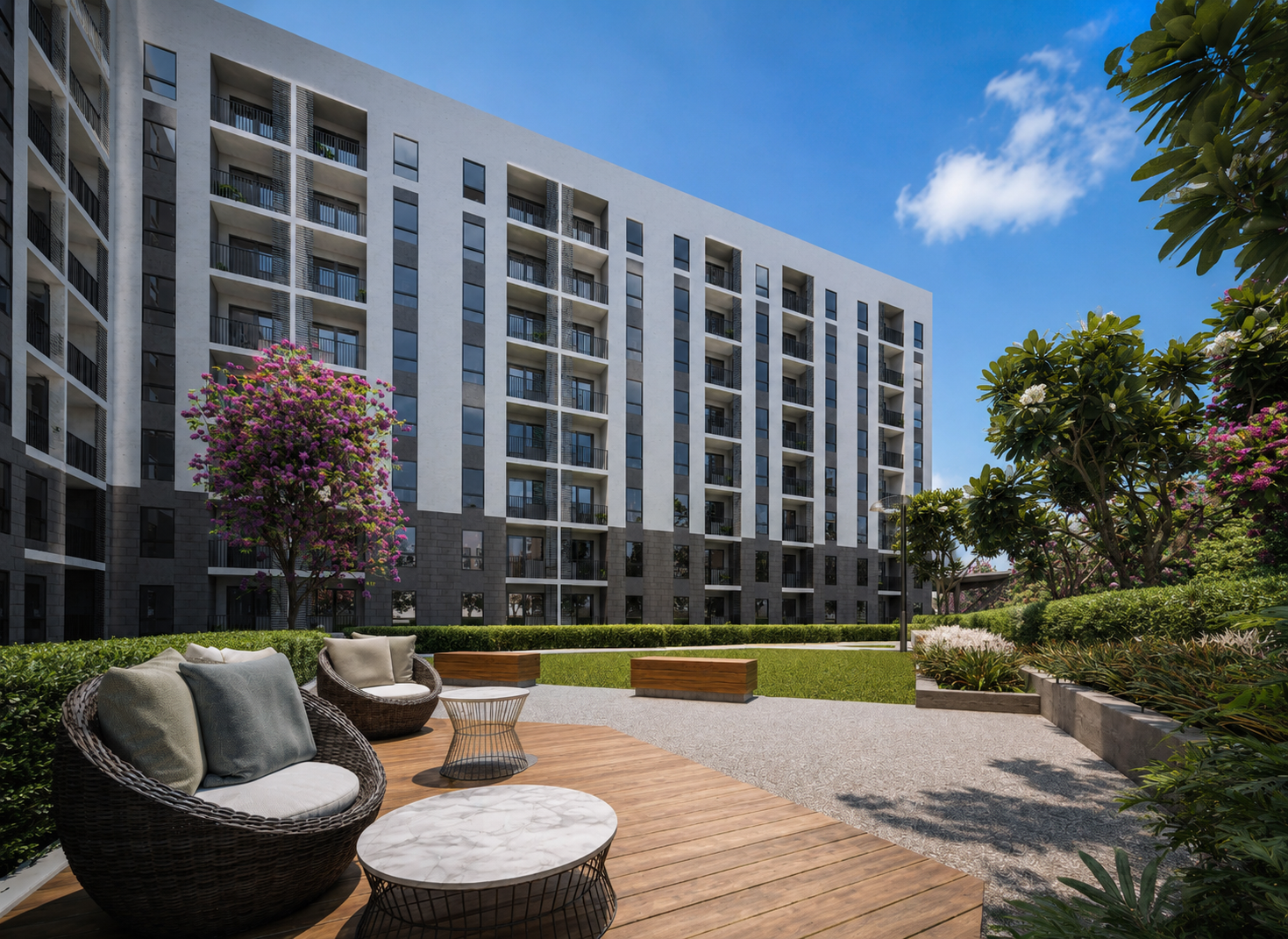Landscaped garden zone and elevated walkway at One Lancaster Park Imus Cavite &mdash; part of the 70% open space designed for quiet outdoor use